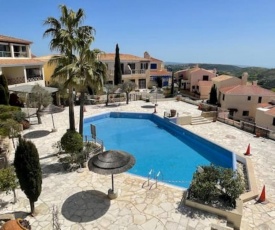 Lovely two bedroom apartment in Tsada, Paphos with Pool and Sea Views