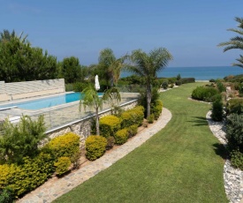 Villa Harmonia - 4 Bedroom Luxury Beach Front Villa with private Swimming Pool